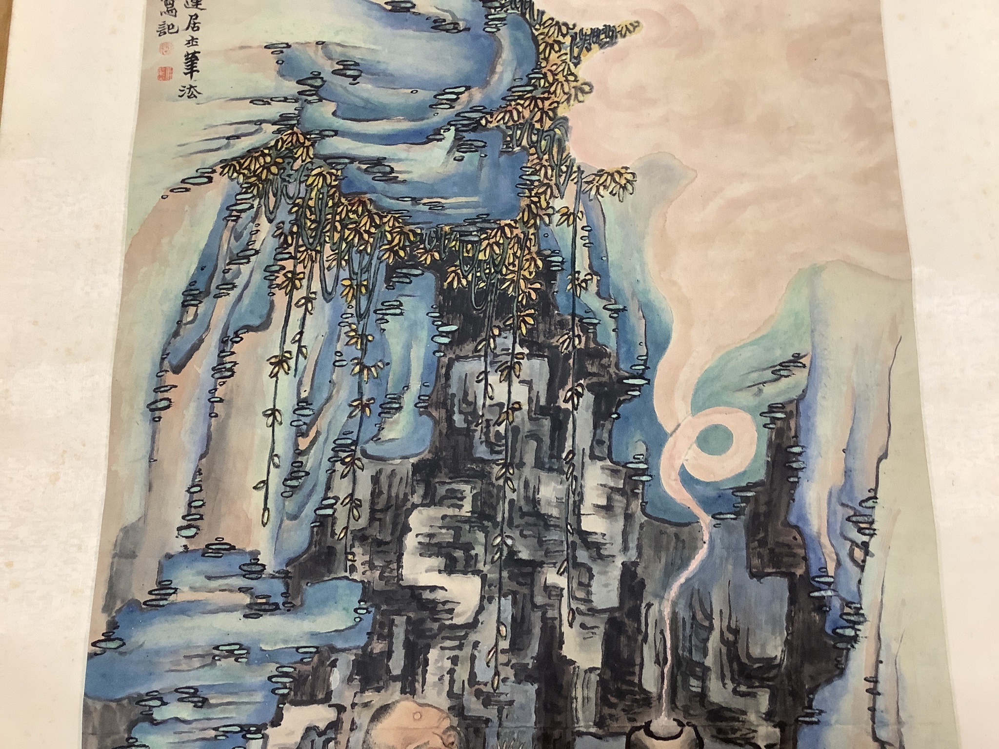 Two Chinese scroll paintings on paper, 20th century, depicting a Luohan in a cave and a scholar amid prunus Images 103 cm X 47 cm and 132 cm X 32.5 cm